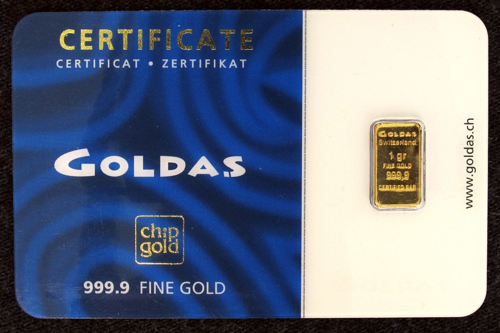 A one-gram gold bar sealed in a certificate card