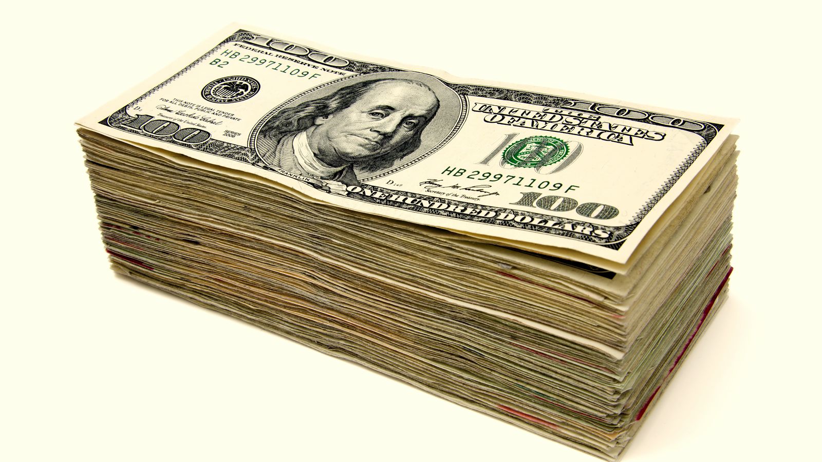 A thick stack of US hundred-dollar bills