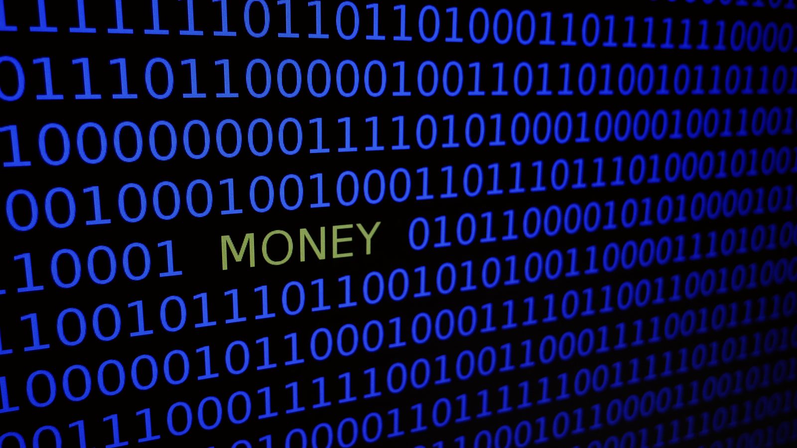 Rows of binary digits on a blue screen with the word money highlighted