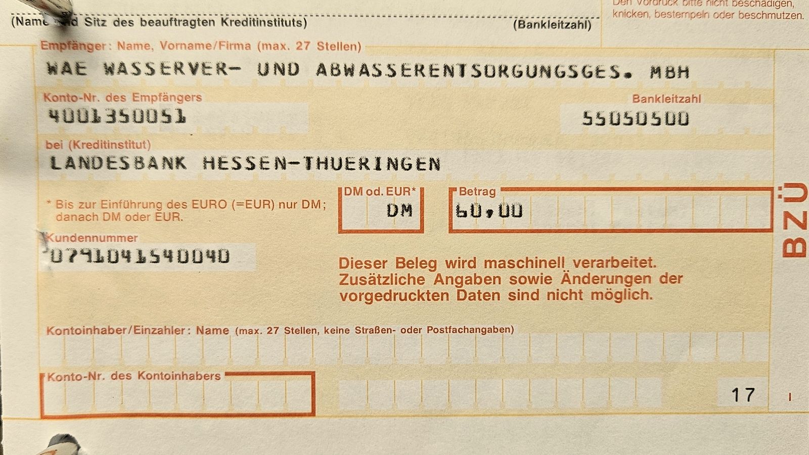 A filled-in German paper bank transfer form