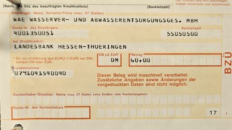 A filled-in German paper bank transfer form