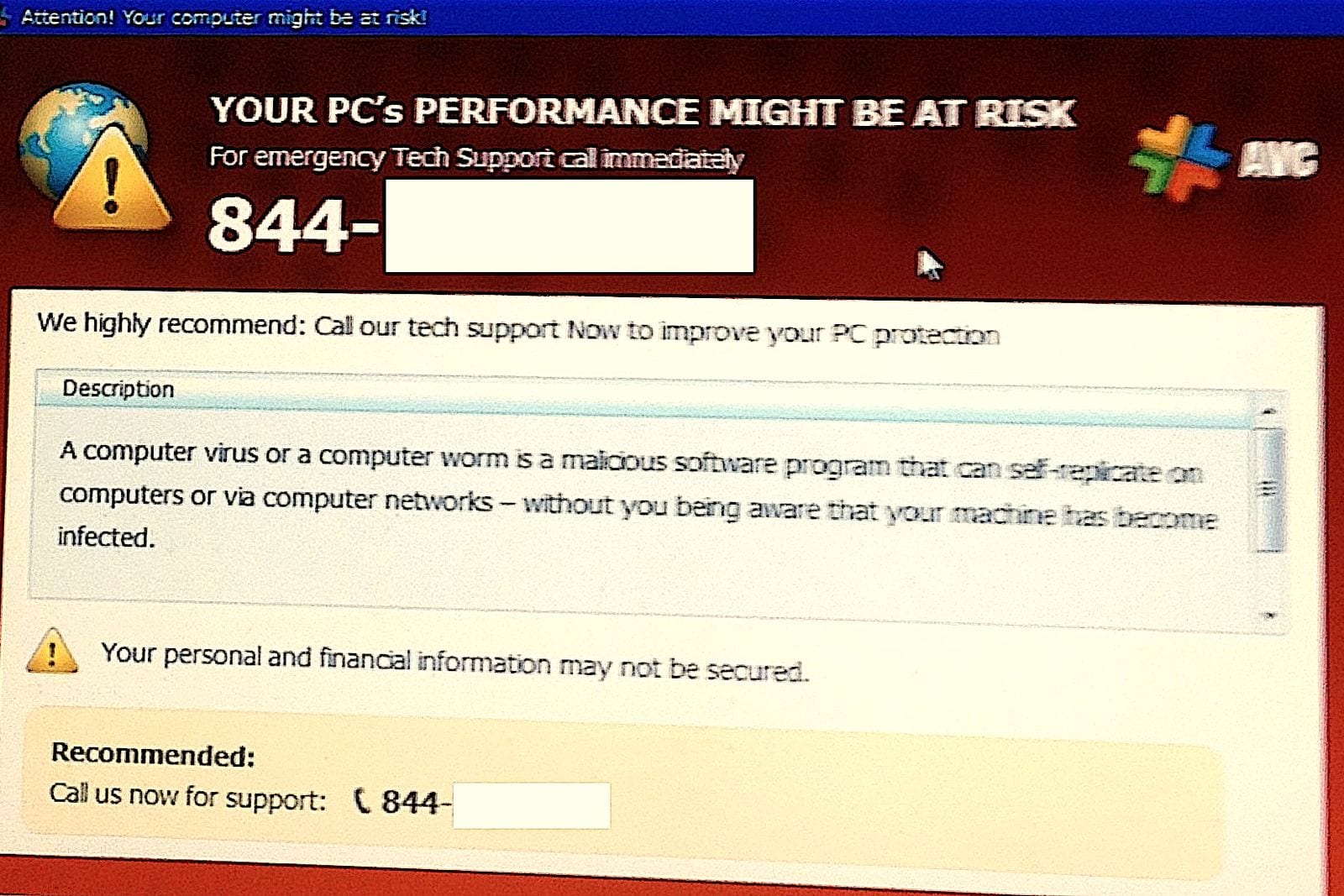 A fake security warning on a computer screen urging the user to call a support number