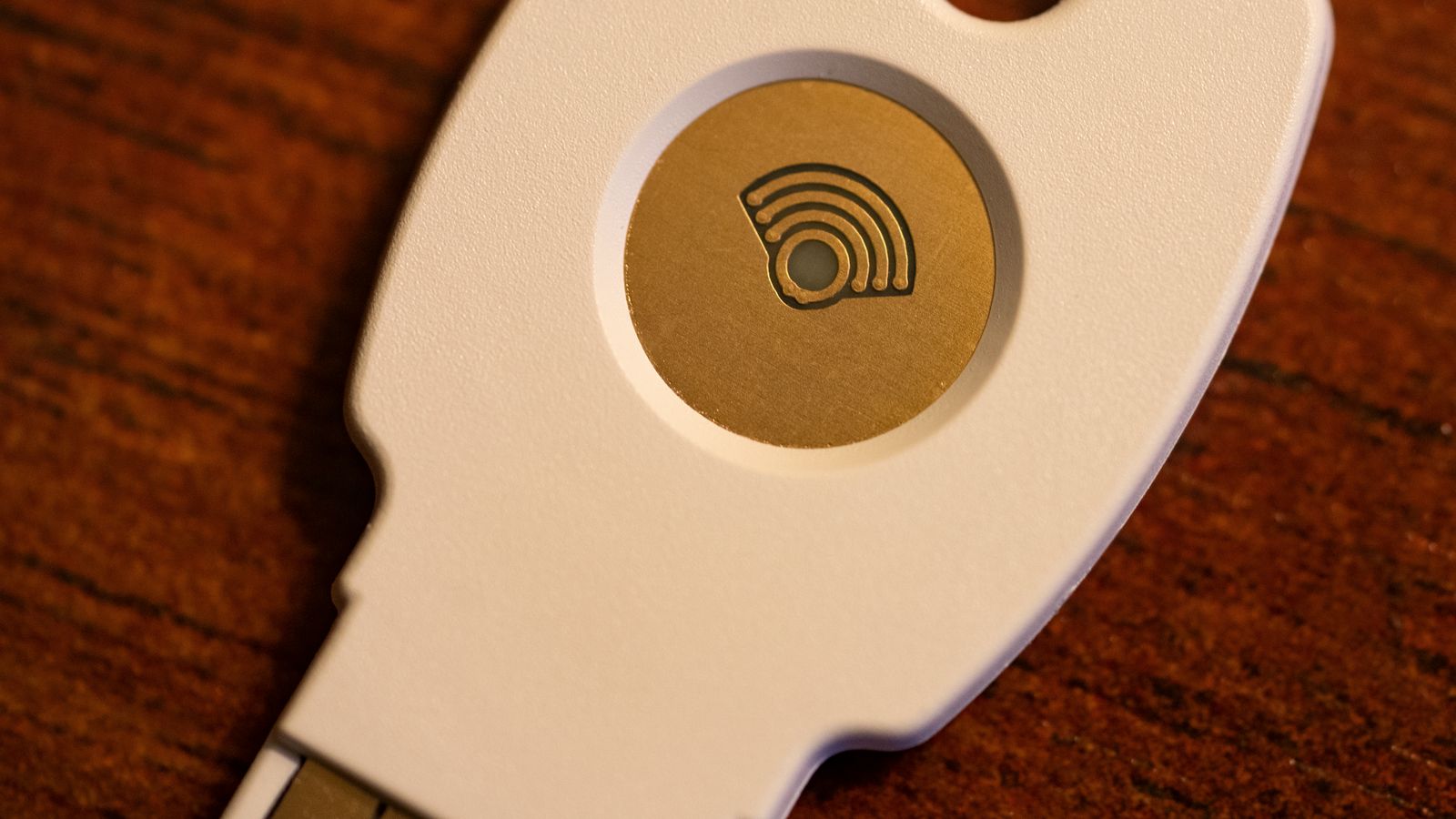 A white hardware security key used for two-factor sign-in