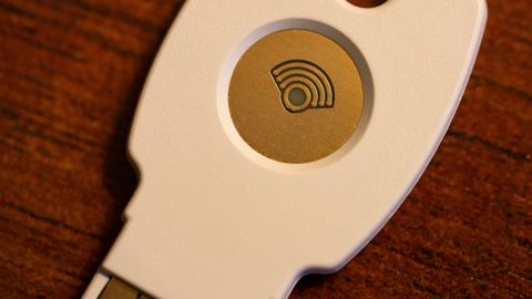 A white hardware security key used for two-factor sign-in