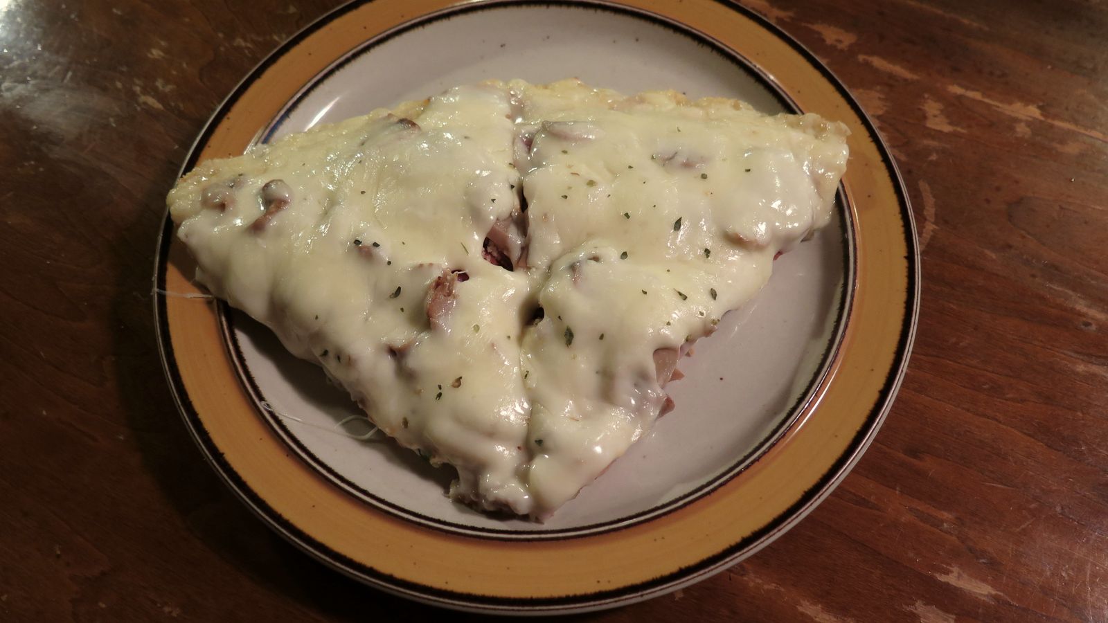 Two slices of pizza on a plate