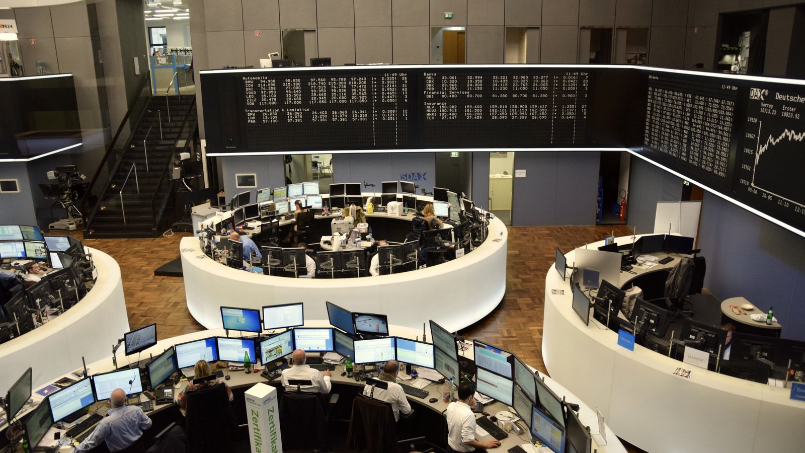 Traders' desks under the price boards at the Frankfurt Stock Exchange